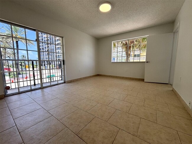property at 8900 Collins Ave