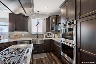 5057 E Loft Cir in Wasilla, AK - Building Photo - Building Photo