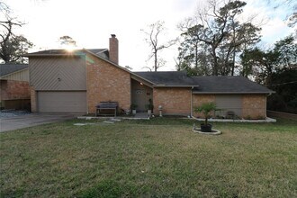 25107 Spring Creek Dr in Spring, TX - Building Photo - Building Photo