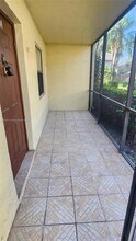 10027 Winding Lake Rd in Sunrise, FL - Building Photo - Building Photo