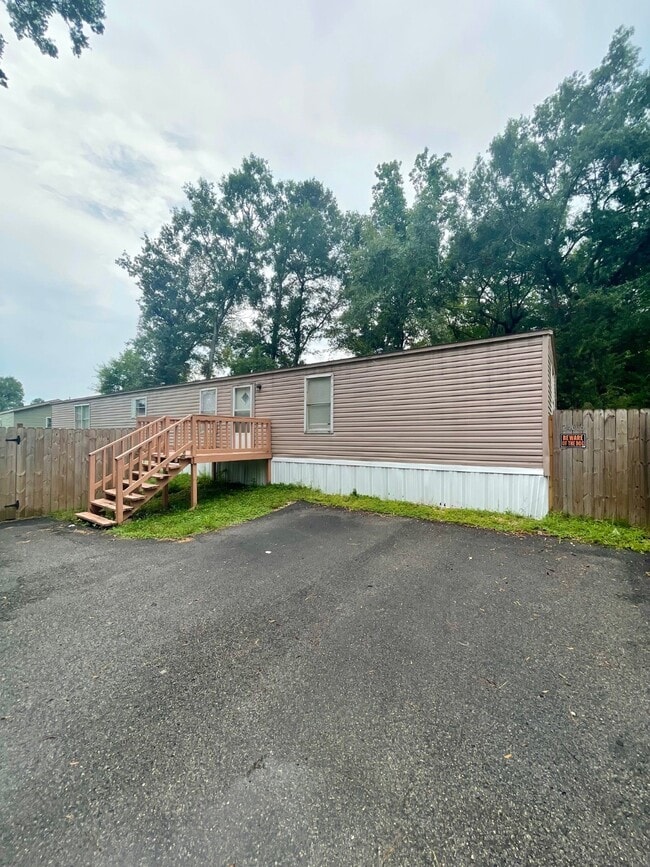 property at 24606 Clennie Needham Rd