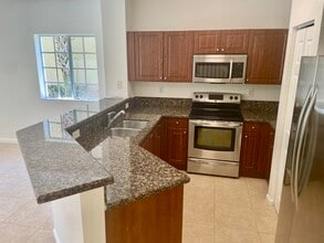 5156 SE Mariner Garden Cir in Stuart, FL - Building Photo - Building Photo