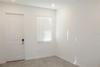 7405 Stone Crk Trl in Kissimmee, FL - Building Photo - Building Photo