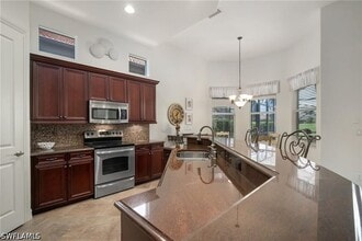 6476 Caldecott Dr in Naples, FL - Building Photo - Building Photo