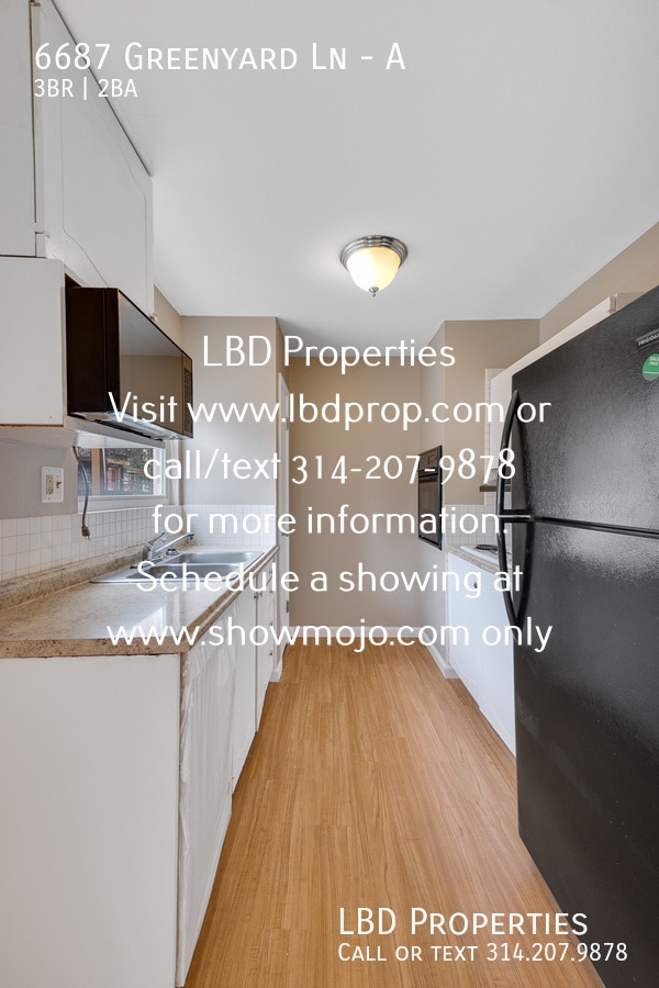 property at 6687 Greenyard Ln