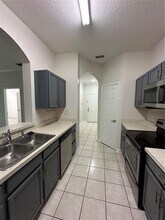 7147 Yacht Basin Ave in Orlando, FL - Building Photo - Building Photo