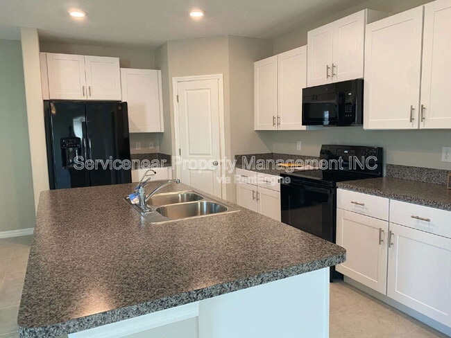 7504 Samuel Ivy Dr in Tampa, FL - Building Photo - Building Photo
