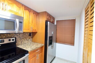 9911 W Okeechobee Rd in Hialeah, FL - Building Photo - Building Photo