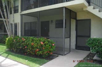 10015 Winding Lake Rd-Unit -103 in Sunrise, FL - Foto de edificio - Building Photo