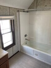 101 Park St N, Unit upper in Minnesota Lake, MN - Building Photo - Building Photo