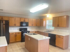 14138 Econ Woods Ln in Orlando, FL - Building Photo - Building Photo