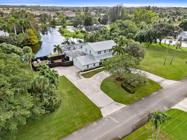 864 Whippoorwill Row in West Palm Beach, FL - Building Photo - Building Photo