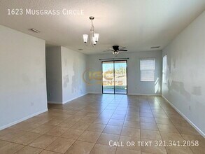 1623 Musgrass Cir in West Melbourne, FL - Building Photo - Building Photo