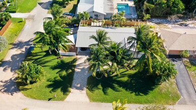 1605 Treemont Ave in Jupiter, FL - Building Photo - Building Photo