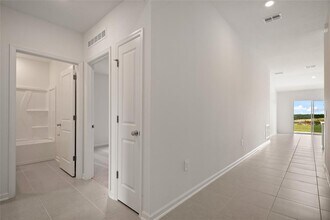 7479 SANDSTONE Dr in Groveland, FL - Building Photo - Building Photo