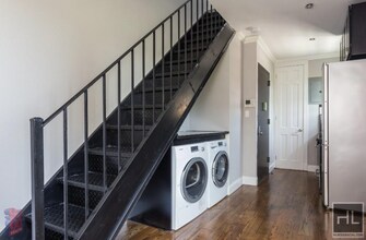 E 105TH ST., Unit 21 in New York, NY - Building Photo - Building Photo