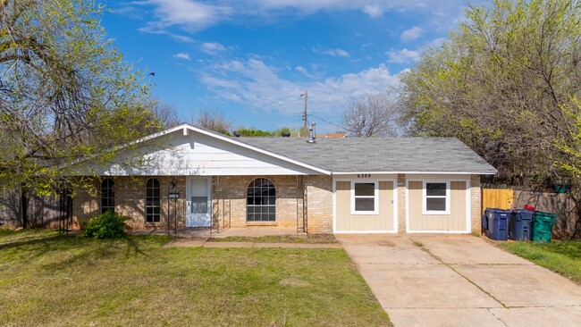 property at 6309 S Robinson Ave