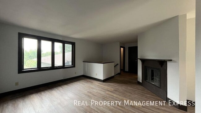 Amazing 3 Bedroom 2.5 Bath duplex with attached garage and fenced yard!