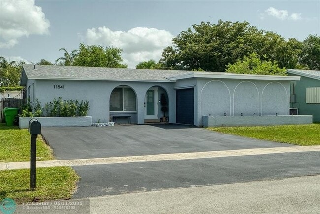 property at 11541 NW 33rd St