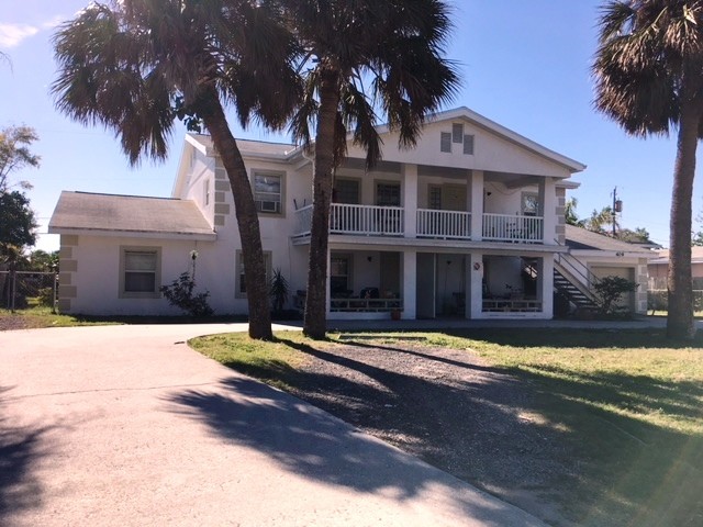 409 Harrison Ave in Cape Canaveral, FL - Building Photo