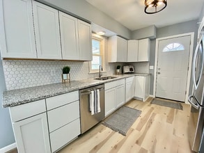 7042 Logan Ave N in Minneapolis, MN - Building Photo - Building Photo
