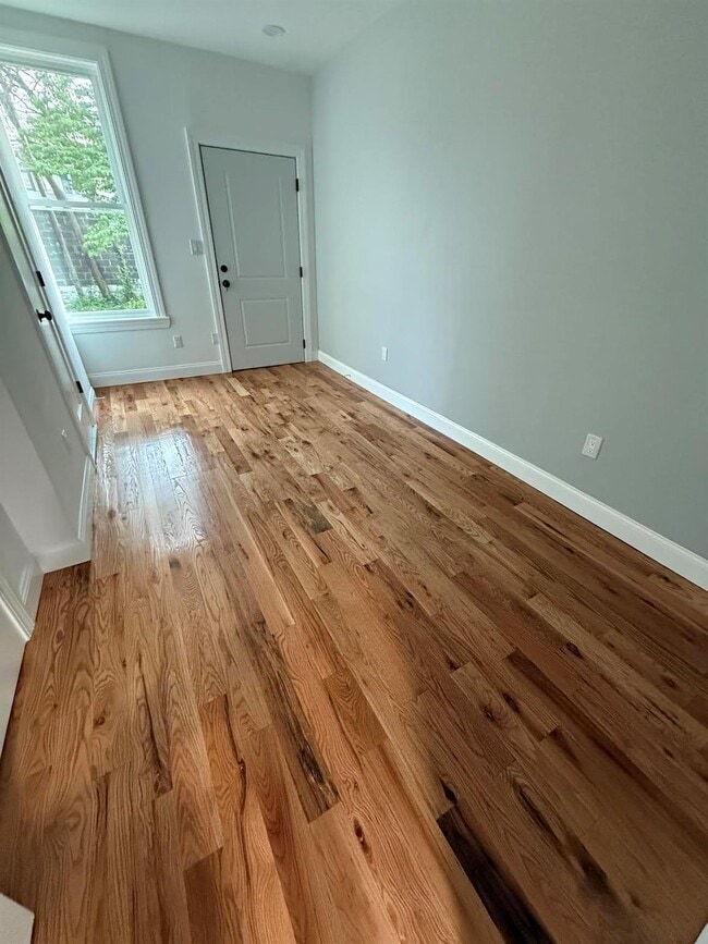 property at 60-58 55th St