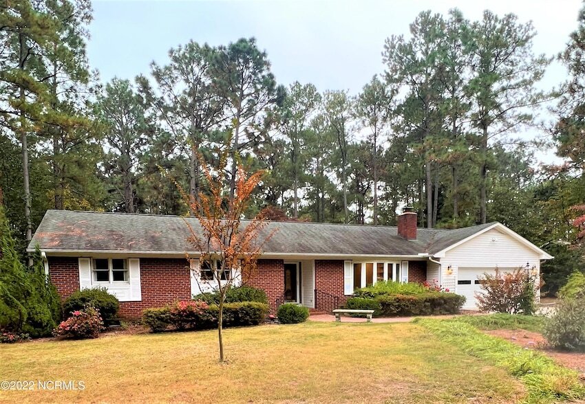 47 Birdie Dr in Whispering Pines, NC - Building Photo