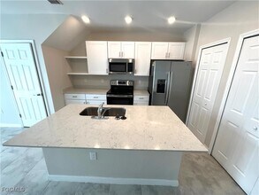 14067 Oviedo Pl in Tice, FL - Building Photo - Building Photo
