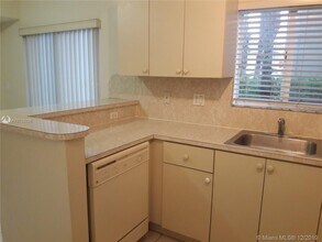 1261 SE 29th St-Unit -106-25 in Homestead, FL - Building Photo - Building Photo