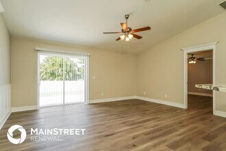 815 Champion Ave in Lehigh Acres, FL - Foto de edificio - Building Photo