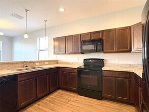 1282 Clove Dr in Poinciana, FL - Building Photo - Building Photo