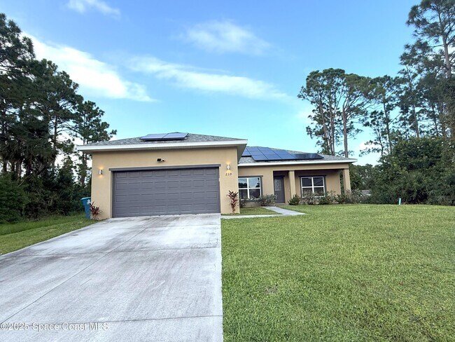 239 Brickell St SE in Palm Bay, FL - Foto de edificio - Building Photo