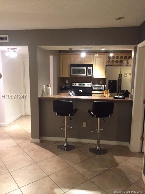 6955 NW 186th St-Unit -F511 in Hialeah, FL - Building Photo - Building Photo