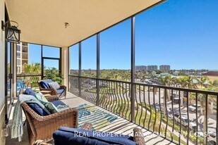 5781 Cape Harbour Dr in Cape Coral, FL - Building Photo