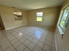 77 Boundary Blvd, Unit D in Rotonda West, FL - Building Photo - Building Photo
