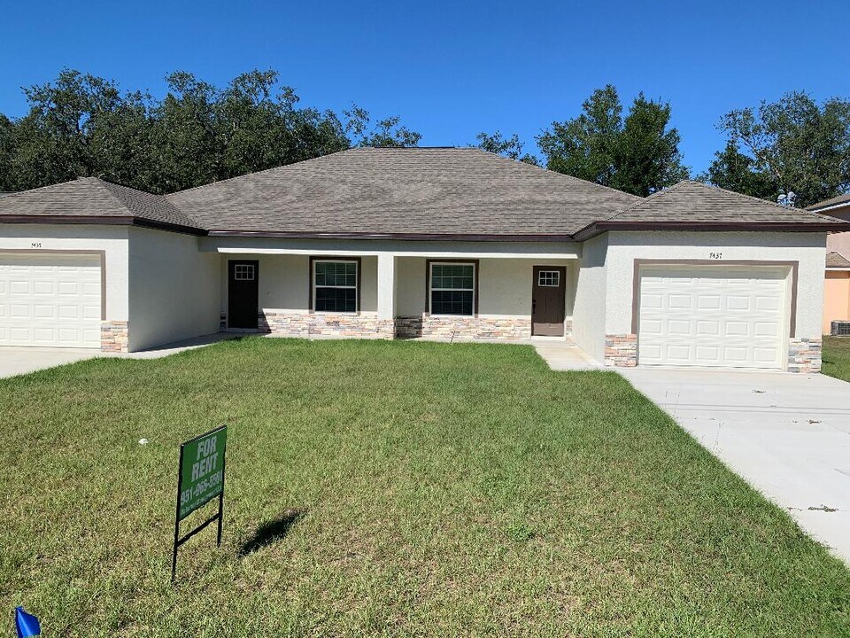 7437 Mead Dr in Spring Hill, FL - Building Photo