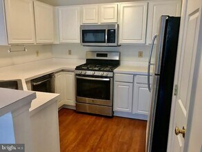 13105 Millhaven Pl-Unit -7-H in Germantown, MD - Building Photo - Building Photo
