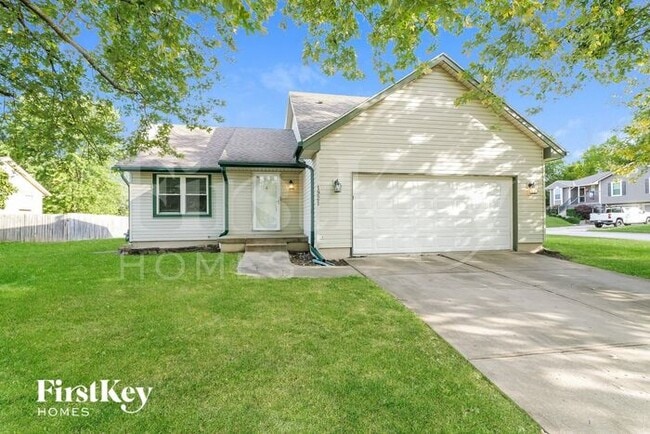 property at 1921 NE Red Oak Ln