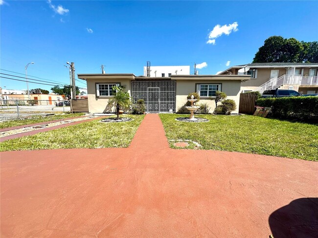 property at 307 E 5th St