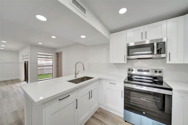 property at 10805 NW 7th St