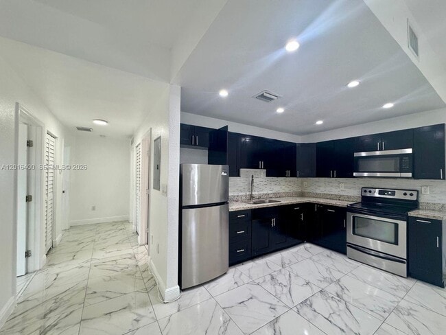 property at 7703 NW 3rd Ave