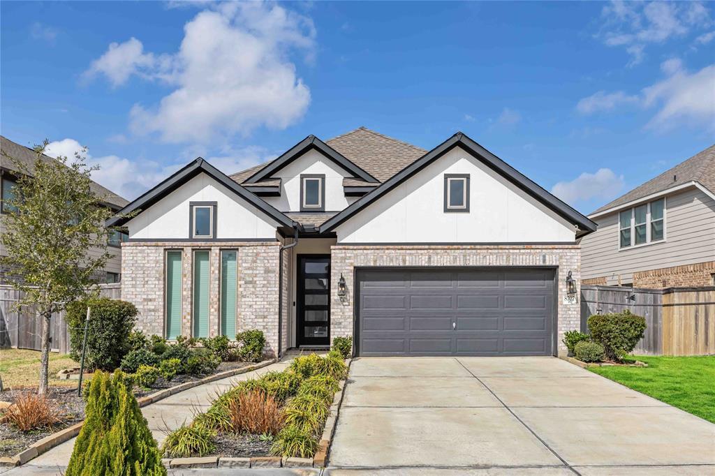 8707 Windsong Trail Dr in Sienna, TX - Building Photo