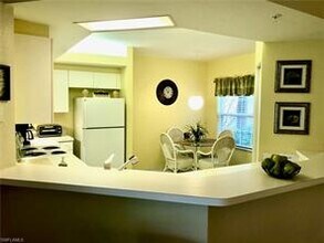 6918 Satinleaf Rd N-Unit -102 in Naples, FL - Foto de edificio - Building Photo