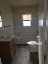 416 E 115th St in Los Angeles, CA - Building Photo - Building Photo