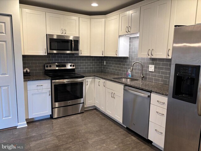 9507 Briar Glenn Way in Gaithersburg, MD - Building Photo - Building Photo