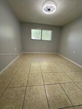 6935 NW 179th St in Miami Gardens, FL - Building Photo - Building Photo