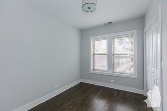 3917 N Janssen Ave, Unit 1E in Chicago, IL - Building Photo - Building Photo