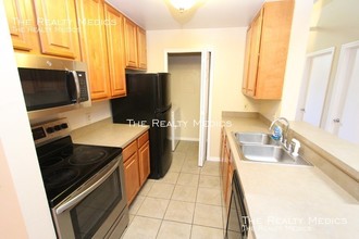 6142 WESTGATE Dr-Unit -#302 in Orlando, FL - Building Photo - Building Photo