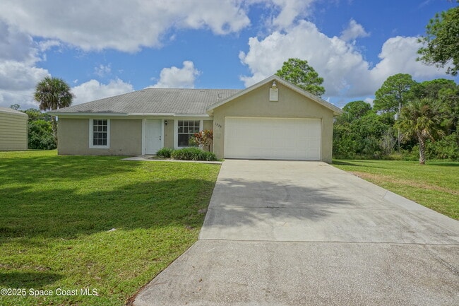 1758 Tradewinds Ave SE in Palm Bay, FL - Building Photo - Building Photo