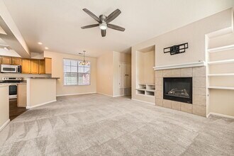 2230 S. Vaughn Way. Unit 104. in Aurora, CO - Building Photo - Building Photo